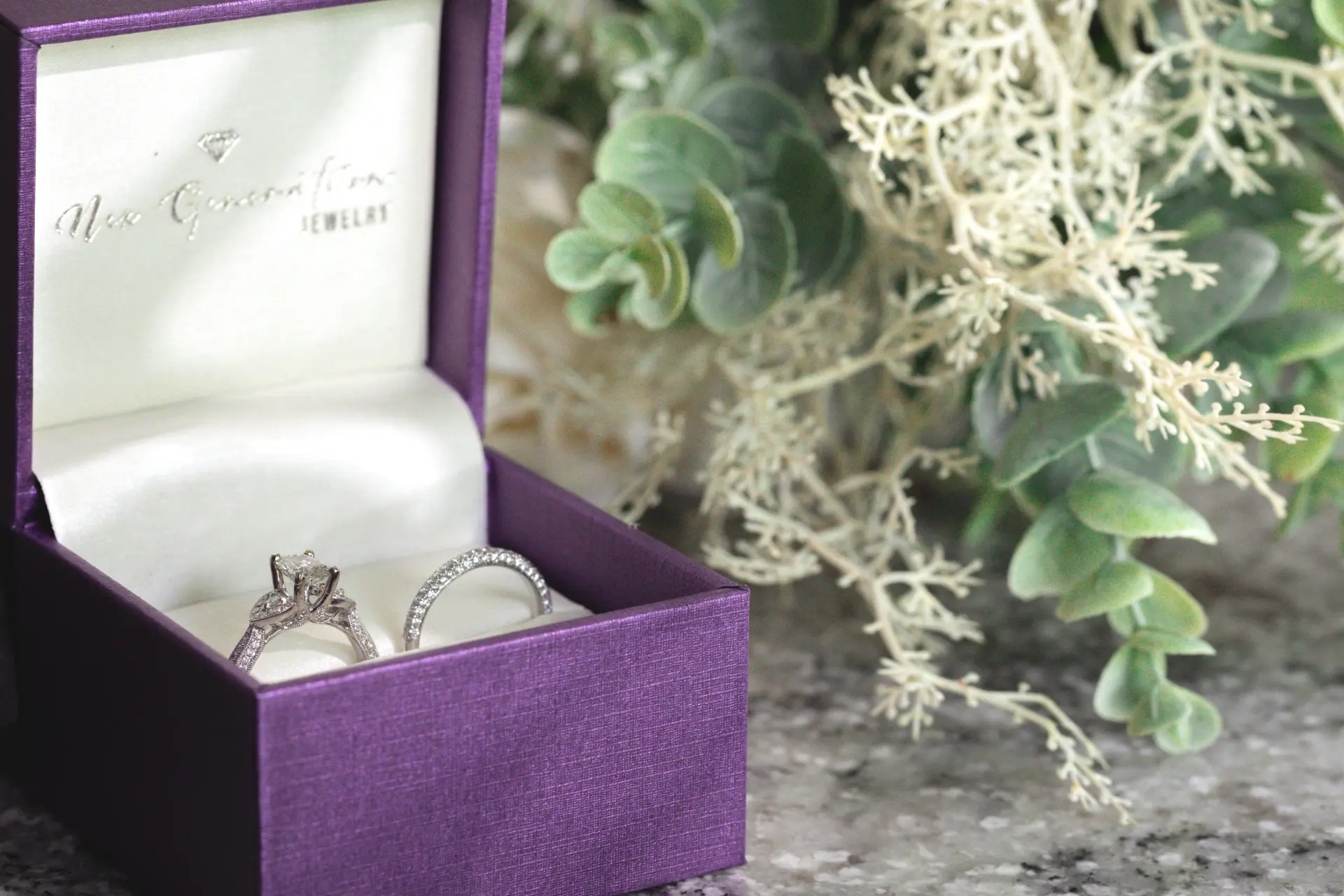 Diamond engagement ring and matching wedding band set in a purple Nex Generation Jewelry box, bridal rings in St. Peters, MO
